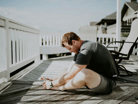 man stretching in the sun