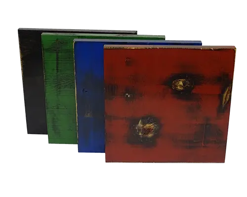 Thumbnail: Foto van de vier kleuren inlegblaadjes rechtopstaand achter elkaar.