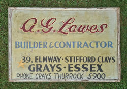 An Old Garage Sign Before Tidying