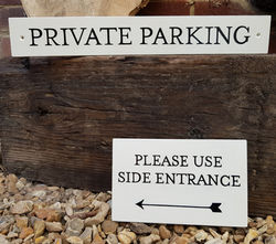 Small bespoke hand painted gate signs