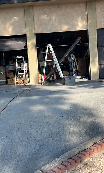 garage door off track before