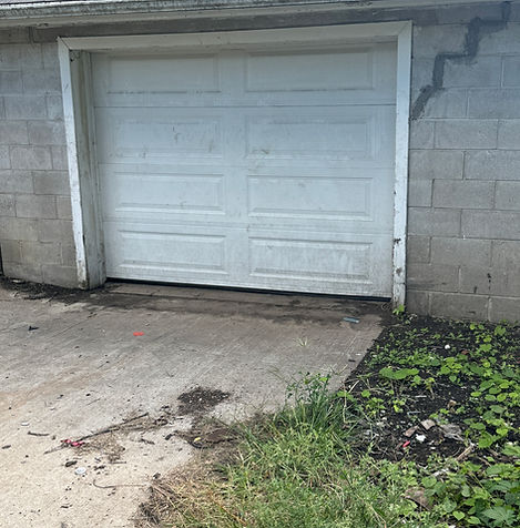 after garage door off track repair