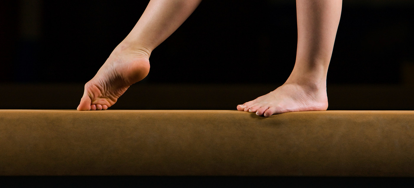 Female Gymnast on Balance Beam