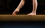 Female Gymnast on Balance Beam