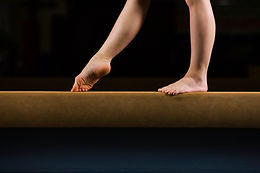 Female Gymnast on Balance Beam