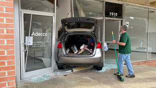 Driver crashes through storefront window in Collinsville