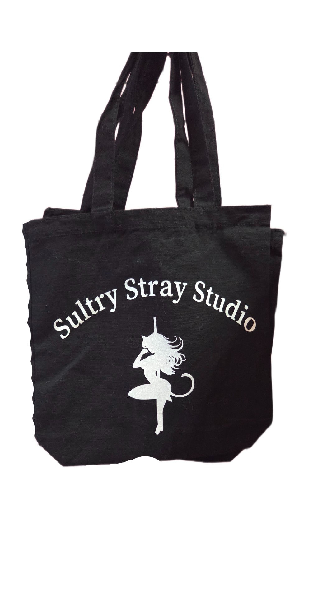 Black tote bag featuring Sultry Stray Studio logo and stylized dancer.
