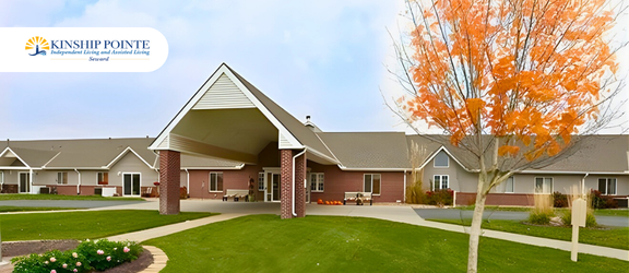 Exterior view of Kinship Pointe Seward senior living community showing the accessible, single-level architectural design across from Memorial Hospital in Seward, NE.