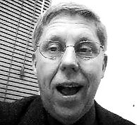 Black & white photo of co-owner of Mayhew Signs Inc