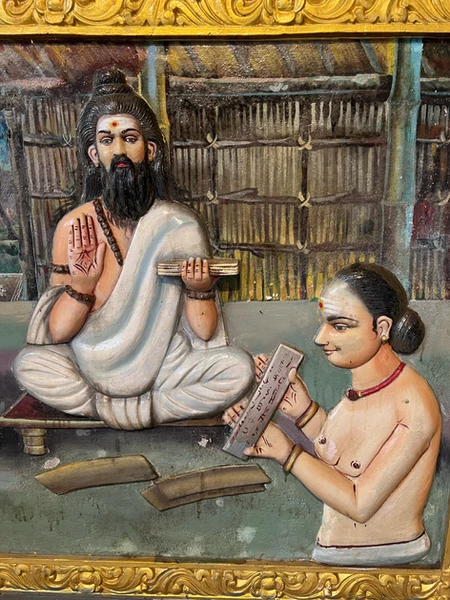 Scholars practicing Sanskrit recitation