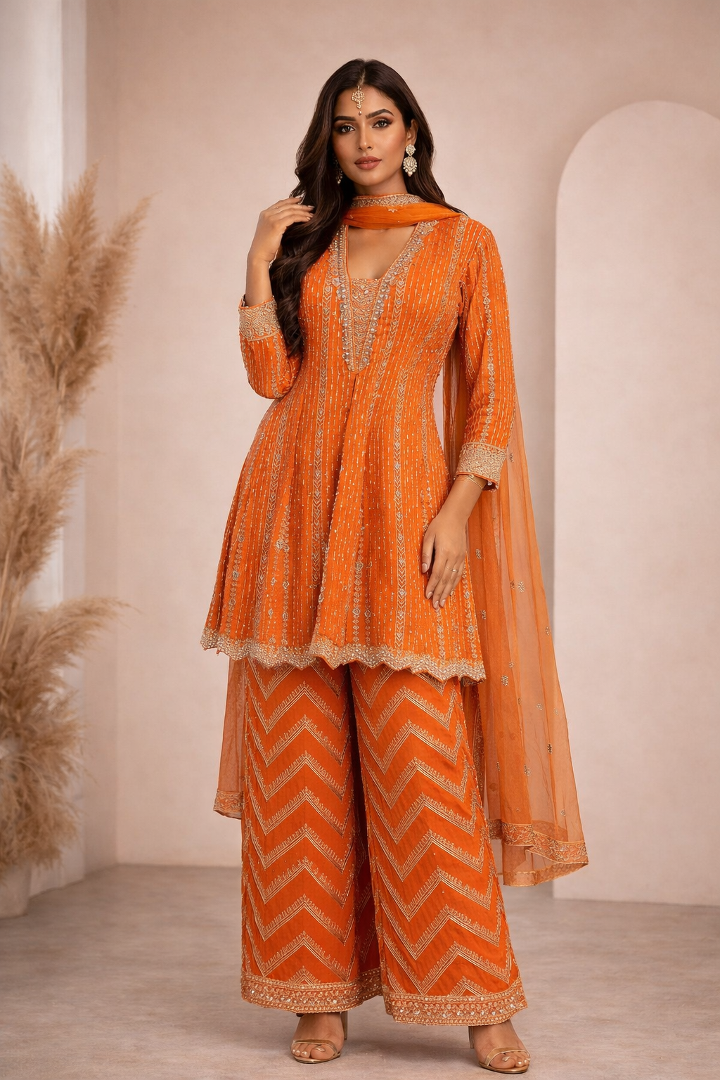 Orange embroidered Pant set with flared kurta, sheer dupatta, and pants