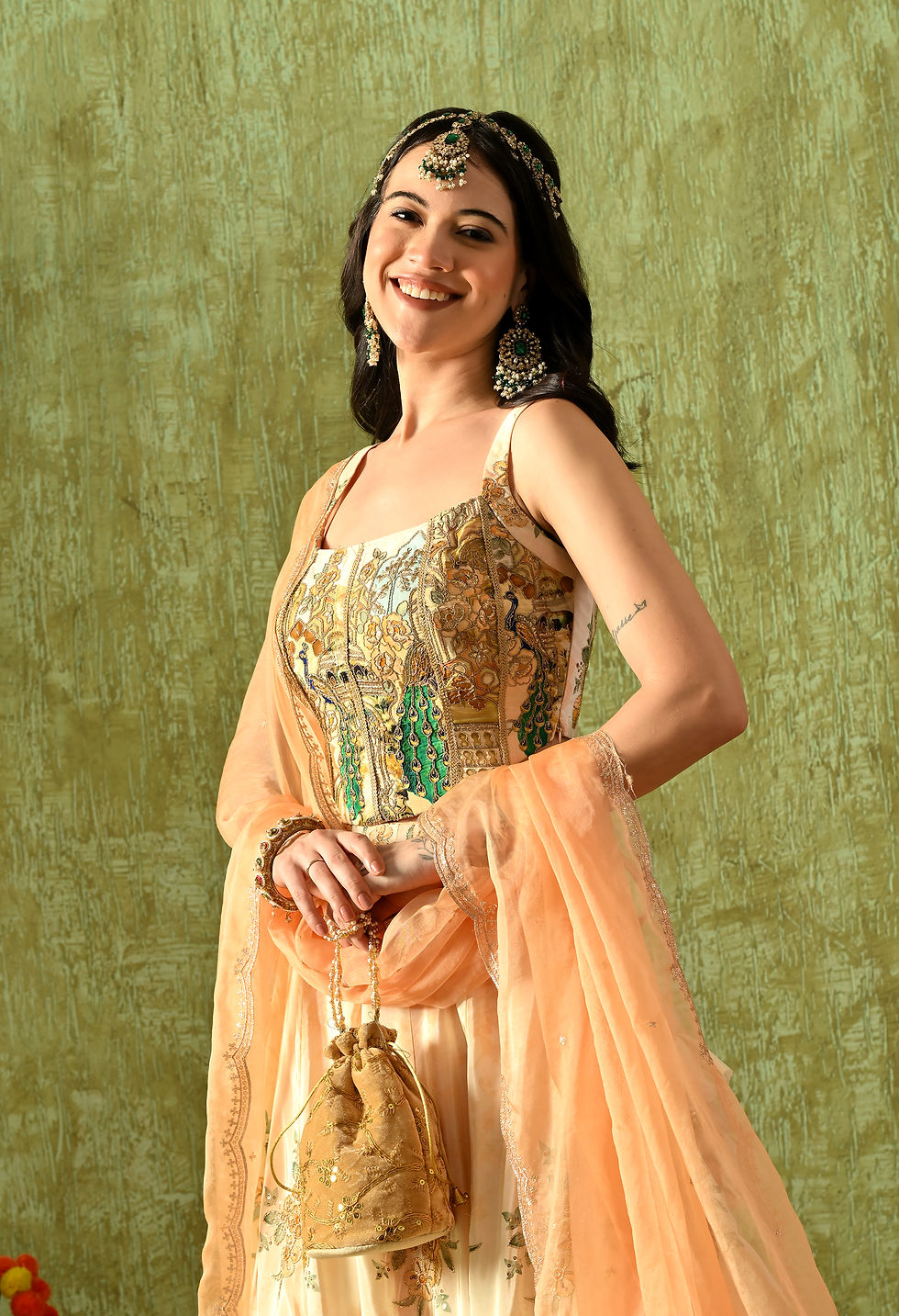 Thumbnail: Lehengha featuring a soft corset blouse in luxurious crepe, accompanied by an et