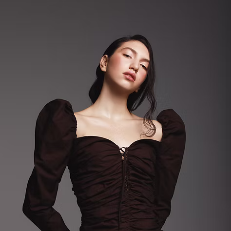 Girl in Brown Dress.avif