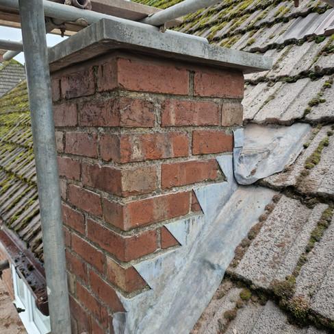 Chimney shortened and cap added to prevent things falling in