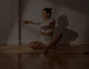 A Woman Stretching doing yoga_edited_edi