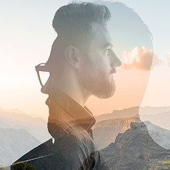 Triple exposure portrait of a businessman combinated with beautiful mountain landscape on 
