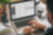 email marketing - measuring success. man using computer to check email