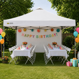 10x20 white canopy tent with tables and chairs set up for a backyard birthday party rental