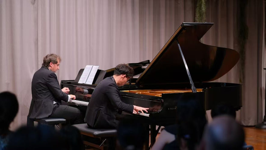 A double grand piano concert of pianists Andy Deng and Christopher Malek