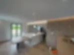 Faux plafond en placo avec bandeau LED intégré réalisé lors d’une rénovation intérieure à Épagny-Met