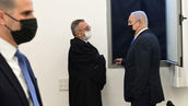Netanyahu denies the corruption charges during his trial in occupied Jerusalem