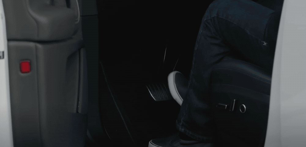 Step on the brake to close the main driver's door