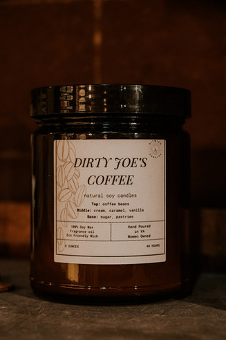 Rustic product photography of a handmade soy wax candle called "Dirty Joe's Coffee."