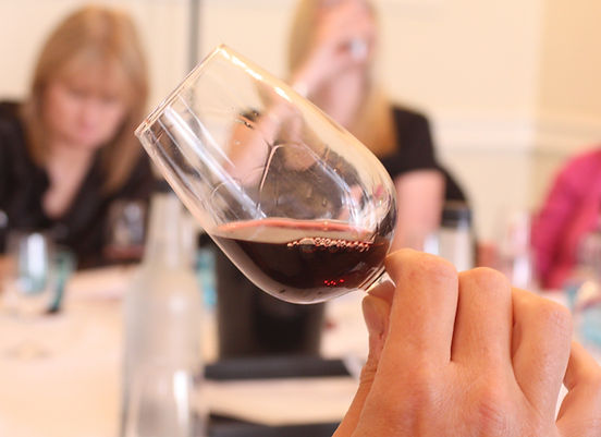 Close up wine in hand.JPG