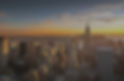 Sunset Over New York City skyline. There is a dark blue overlay with the skyline image peeking through_edited.jpg