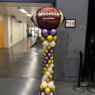 LSU balloon columns with company logos for corporate branding