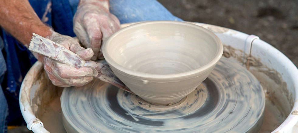 Clay Pot on Pottery Wheel