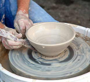 Clay Pot on Pottery Wheel