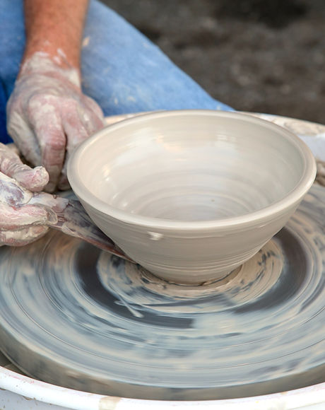 Clay Pot on Pottery Wheel