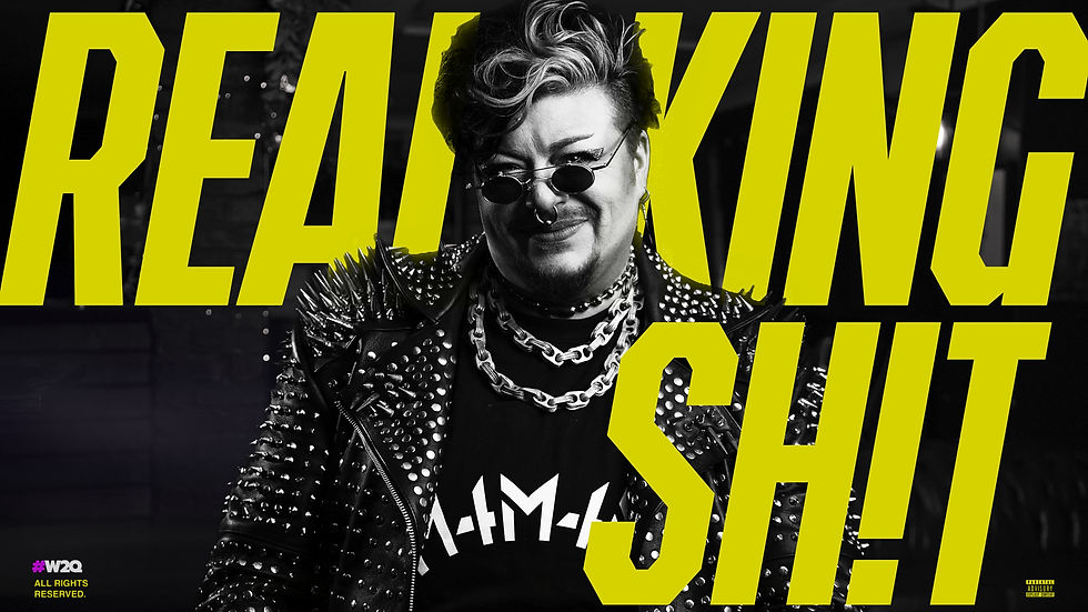 Person in studded leather jacket with text Real King Sh!t