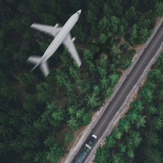 Modern transportation moving through a natural landscape