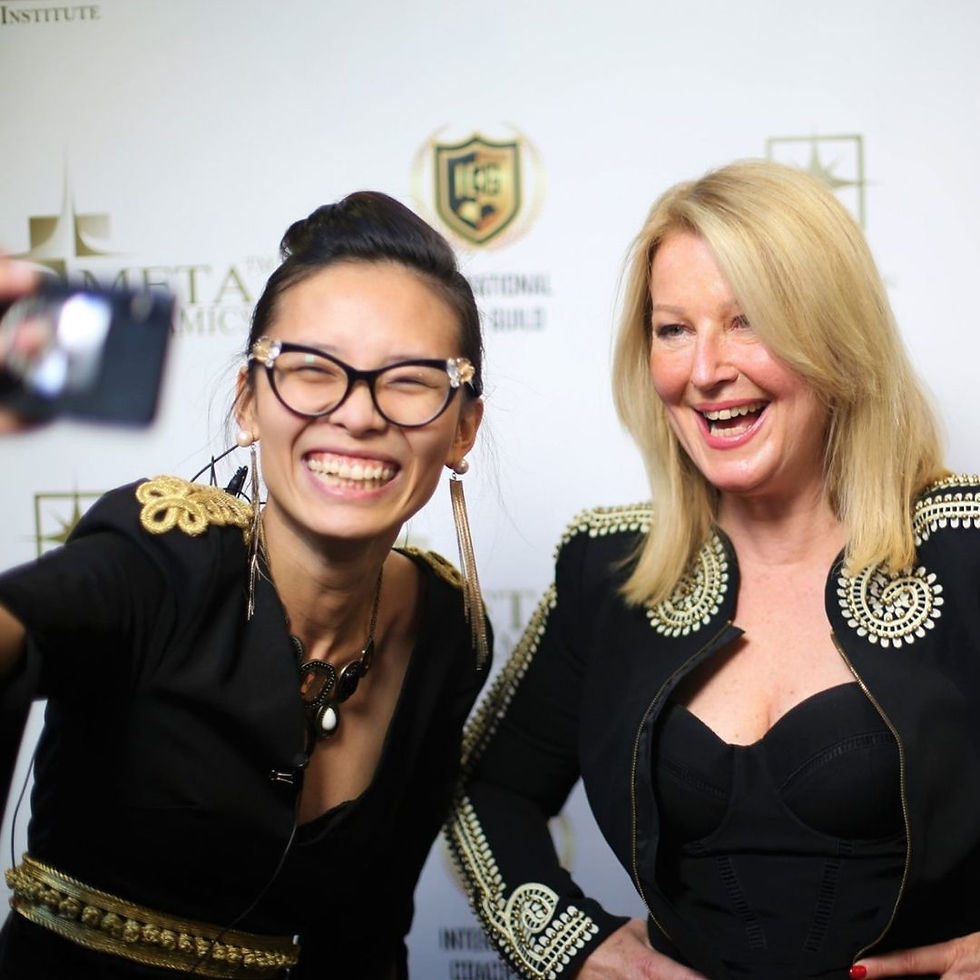 18. REPEATED Glam Elysium Nguyen Global Marketing Institute two women laughing black dress