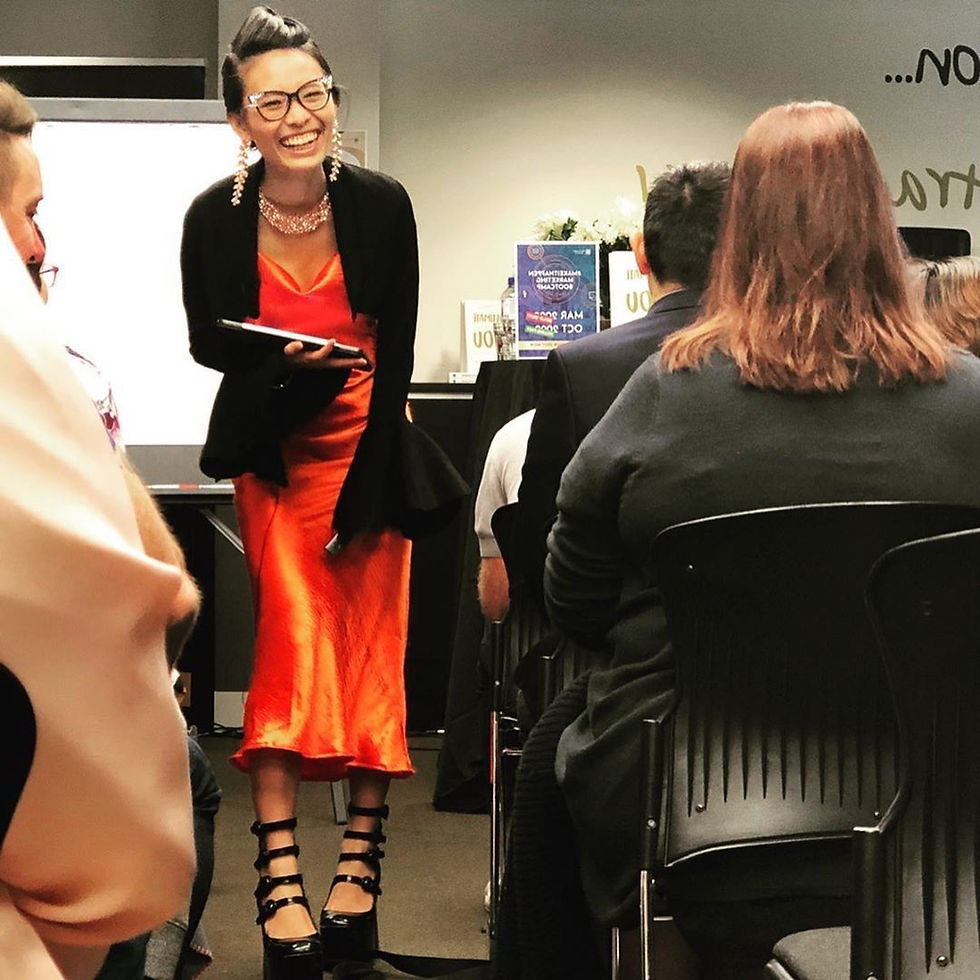 17. Glam Elysium Nguyen Global Marketing Institute marketing training orange dress 1.jpg