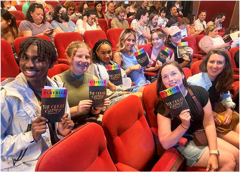 students attending a broadway show