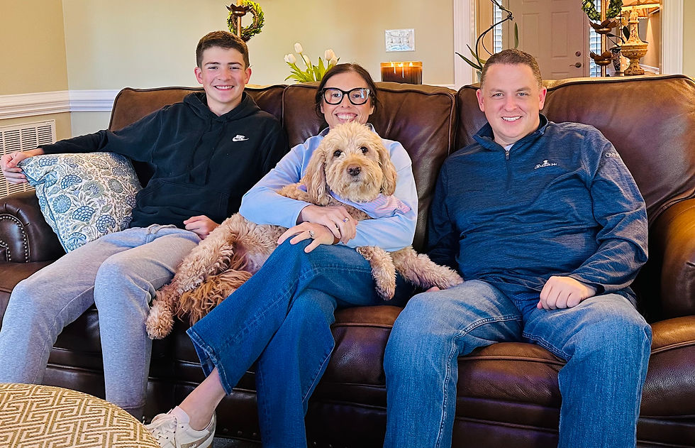 From left, King's son Noah, his wife Nikki, Lucy and Wayne King at their home in Kings Mountain. | Chuck Thompson