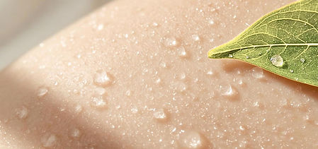 Dewy skin with water droplets reflecting Skin Melio CC’s deep hydration and clean-care promise