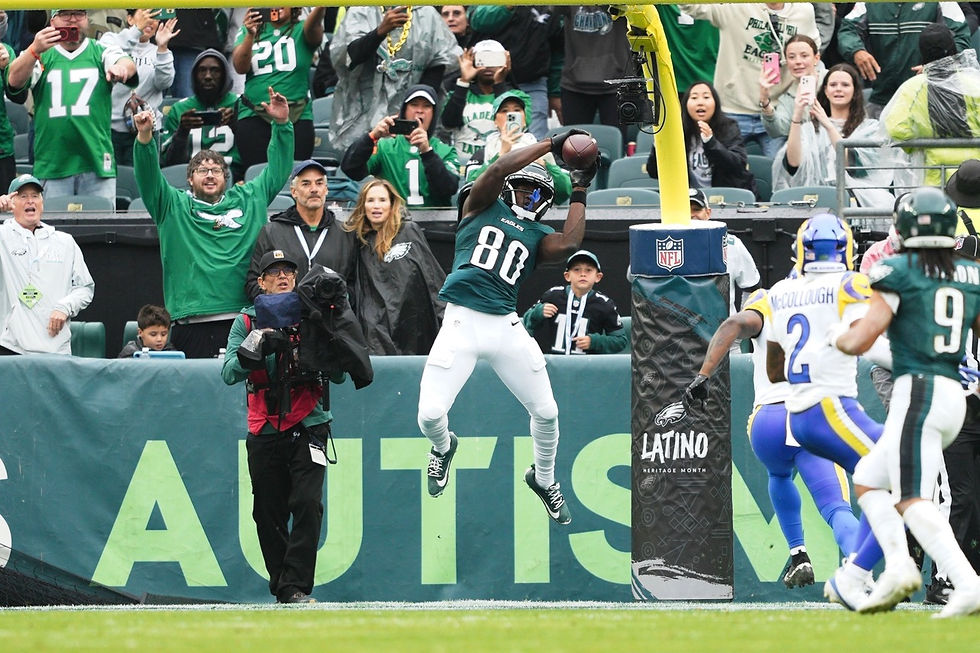Eagles' wide receiver Darious Cooper scores the second of his two TDs on the day. Photo by Andy Lewis