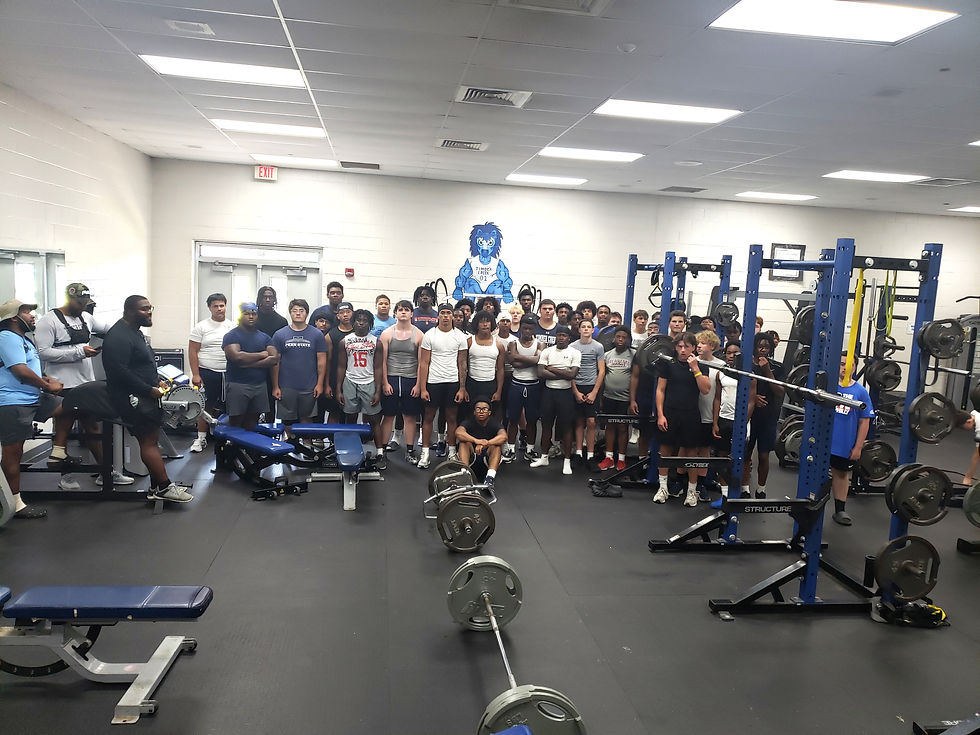 Timber Creek football team at work in the school weight room. Photo by Al Thompson