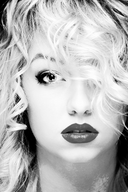 mecurlyhairheadshot_edited