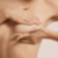 woman-checking-her-breast-breast-cancer.jpg
