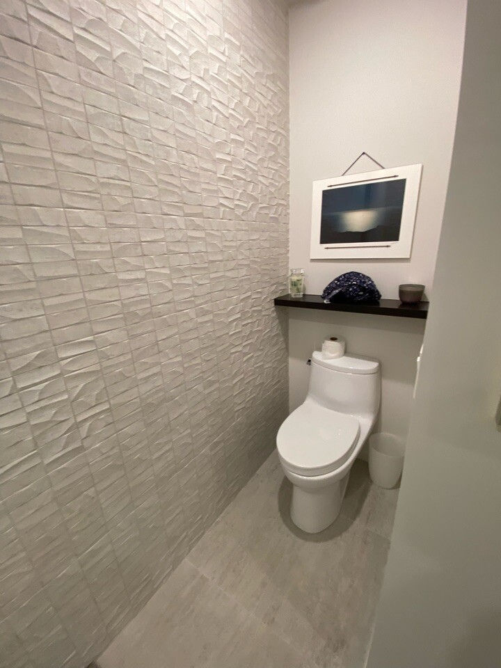 Master Bath Toilet - with new tile continued from Shower