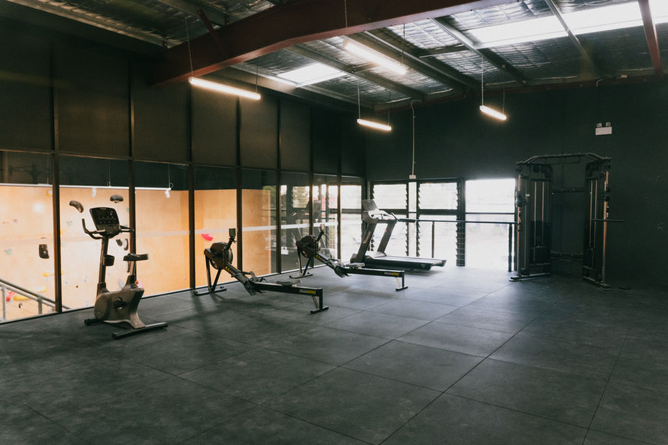 Bicycle, and rowing machine in gym
