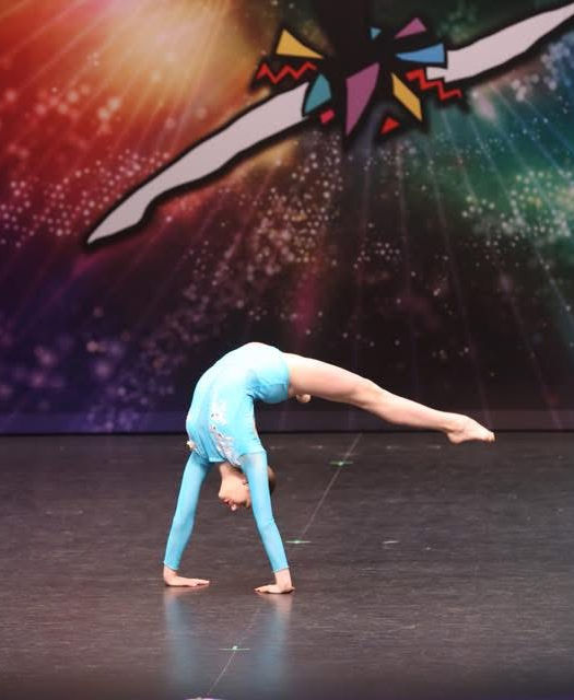 Competitive dancer performing choreography at Live To Dance Performance Complex in Oakville