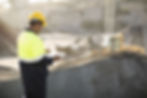 worker-standing-at-quarry-using-clipboard-2026-01-05-00-36-39-utc.jpg
