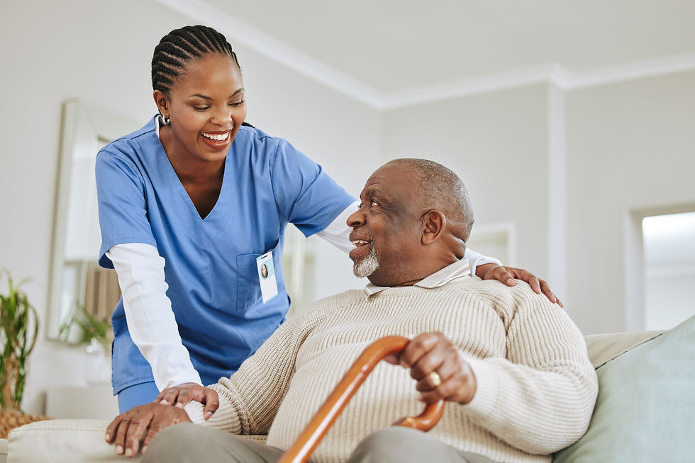 A Nurse of Angel of Mercy Home Health Care smiling with our patient