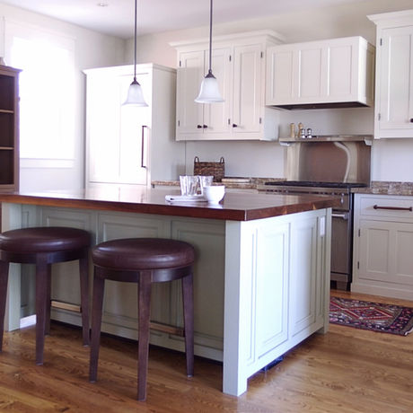 Authentic face frame kitchen with inset doors and drawers, built by a traditional cabinetmaker. Integrated appliances, freestanding furniture and walnut topped island